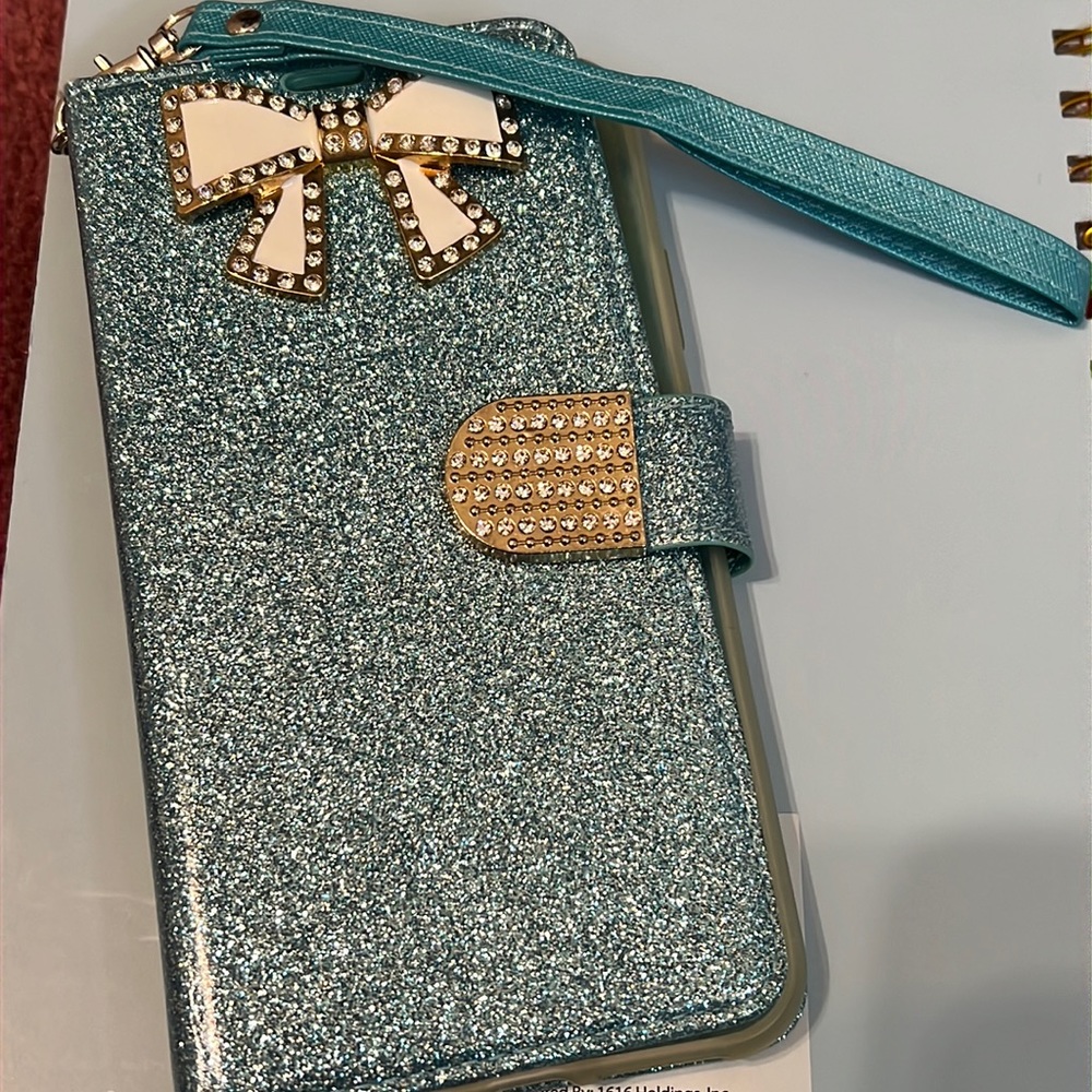 Sparkly bow wallet phone case